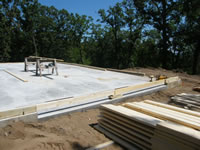 Starting from a cement pad.